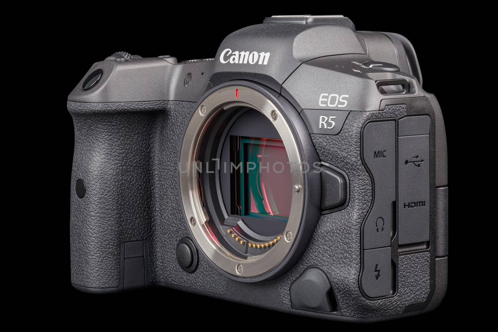 Canon R5 - black professional 35mm full-frame mirrorless camera body with flip screen isolated on black background with focus stacking - Tula, Russia, September 15, 2021