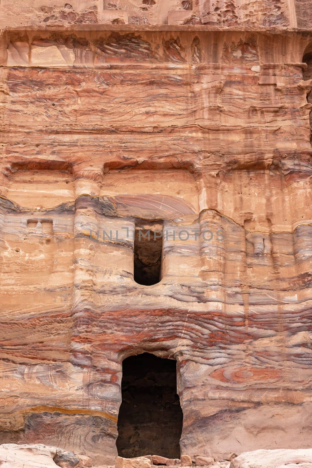 Closeup view of the entrance to one of the temples in Petra archaeological site.  Jordan. Vertically.