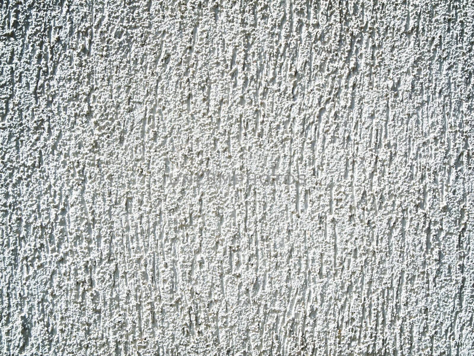 Full-frame view of a white plastered wall.