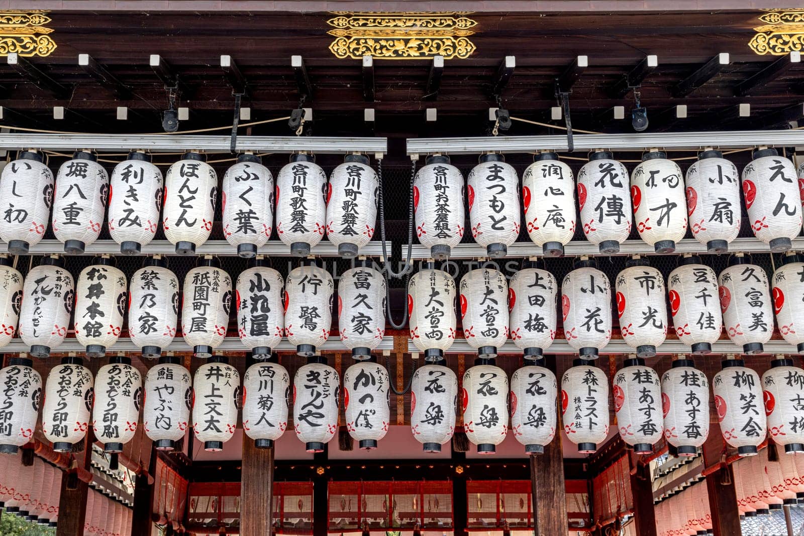 white paper lanterns with japanese calligraphy  temple in kyoto