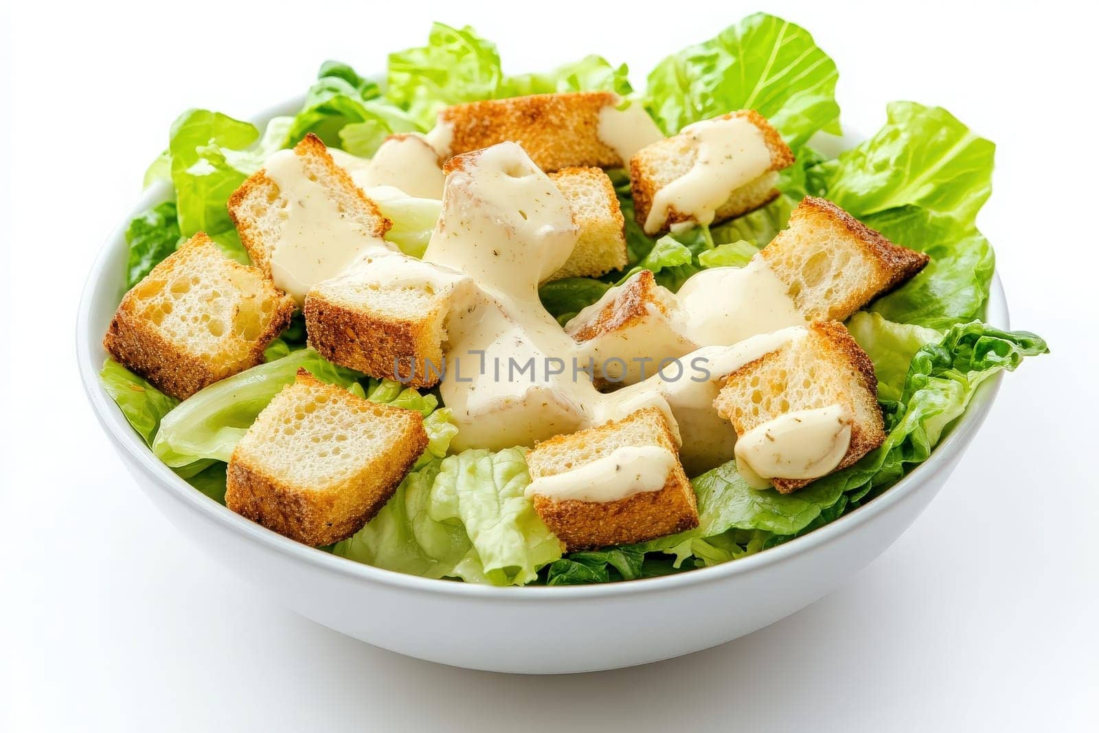 A delicious Caesar salad featuring crisp romaine lettuce, crunchy croutons, and rich creamy dressing. This vibrant dish is perfect for a healthy meal or side dish.