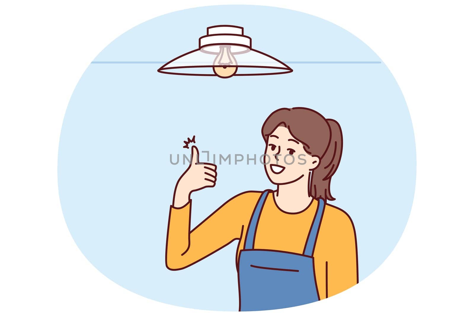 Woman electrician showing thumbs up after fixing chandelier or replacing light bulb under ceiling. Girl in overalls works as electrician efficiently performing tasks of setting up electricity