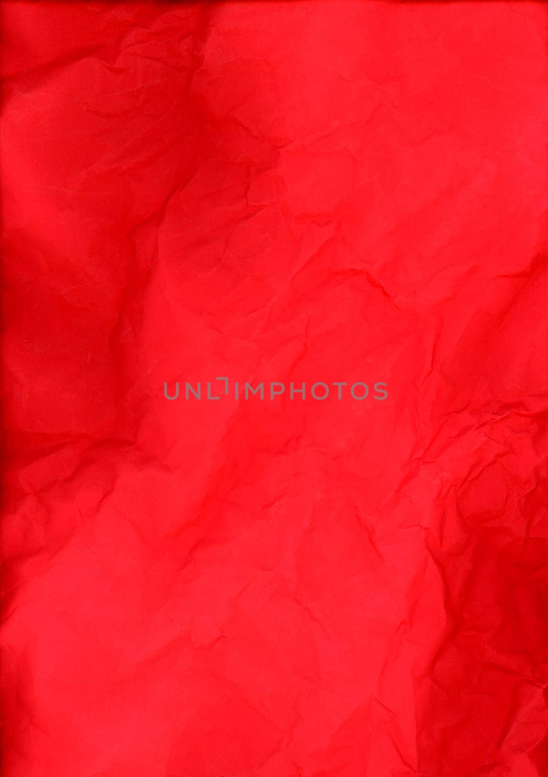 crumpled red paper texture useful as a background