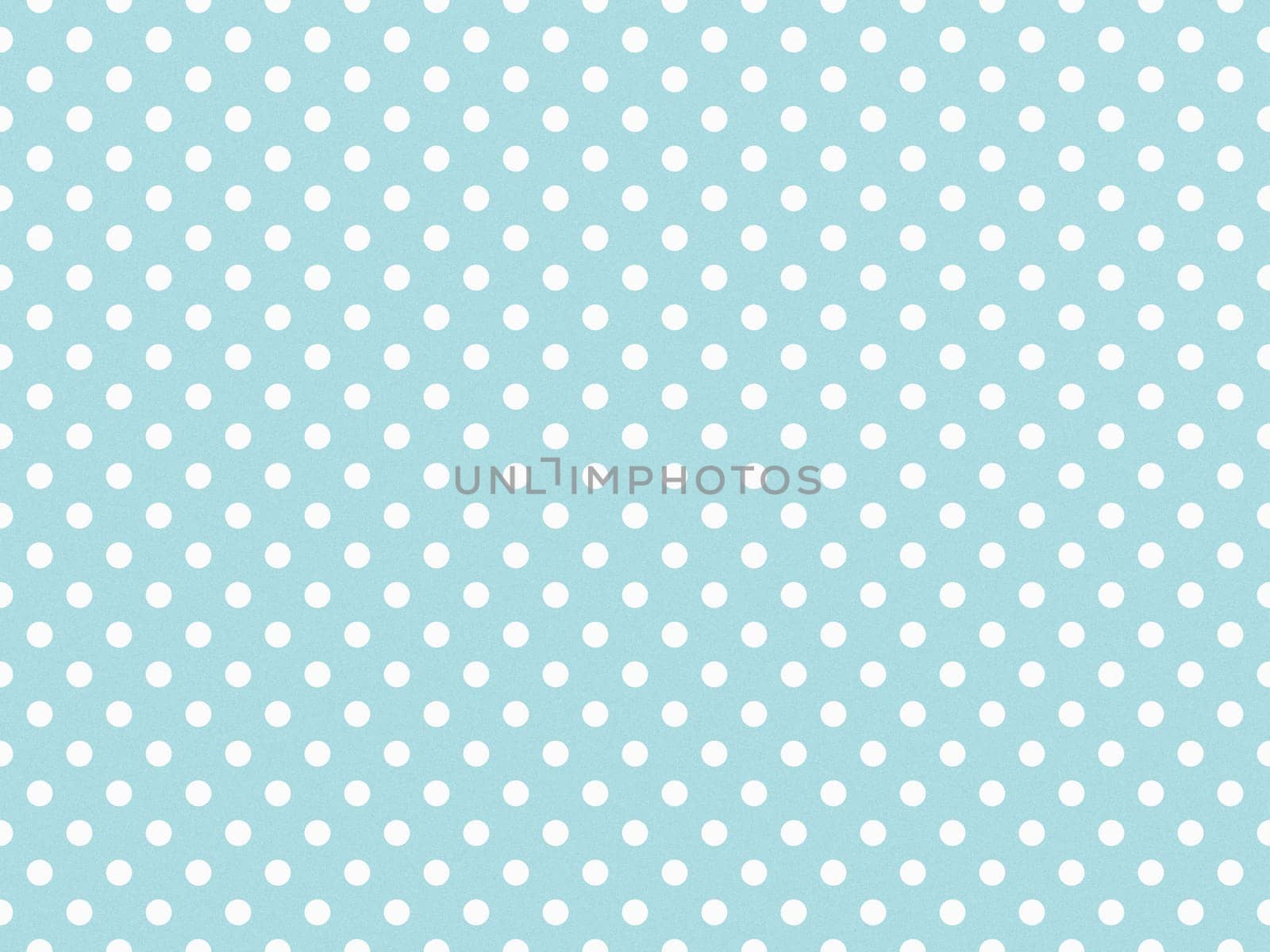 texturised white colour polka dots pattern over powder blue useful as a background
