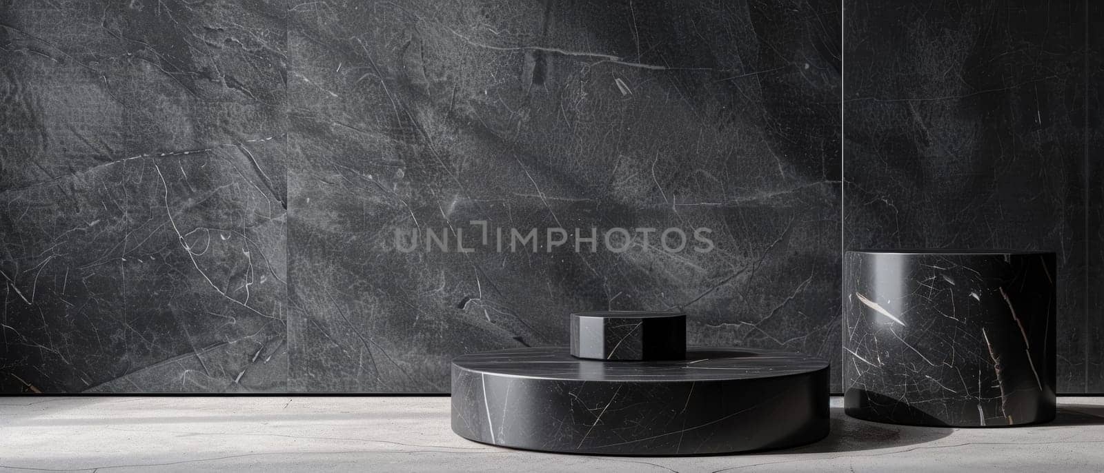 This display contrasts the deep, textured surface of dark stone platforms against a rugged backdrop, with subtle lighting emphasizing the materiality