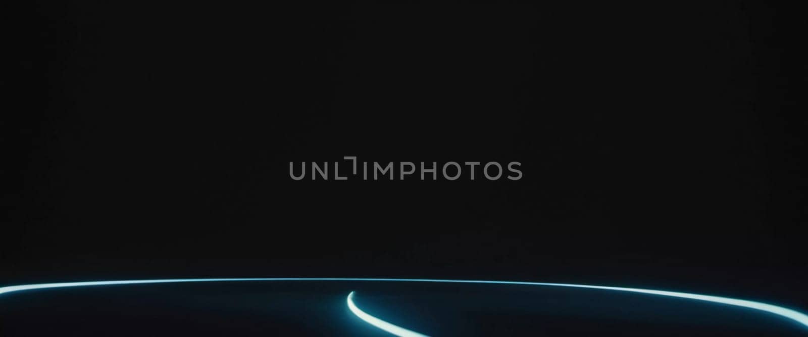 Smooth black backdrop accentuated by soft blue anamorphic bokeh effects. Gentle light waves flow across the surface, creating an ethereal atmosphere. Generative AI.
