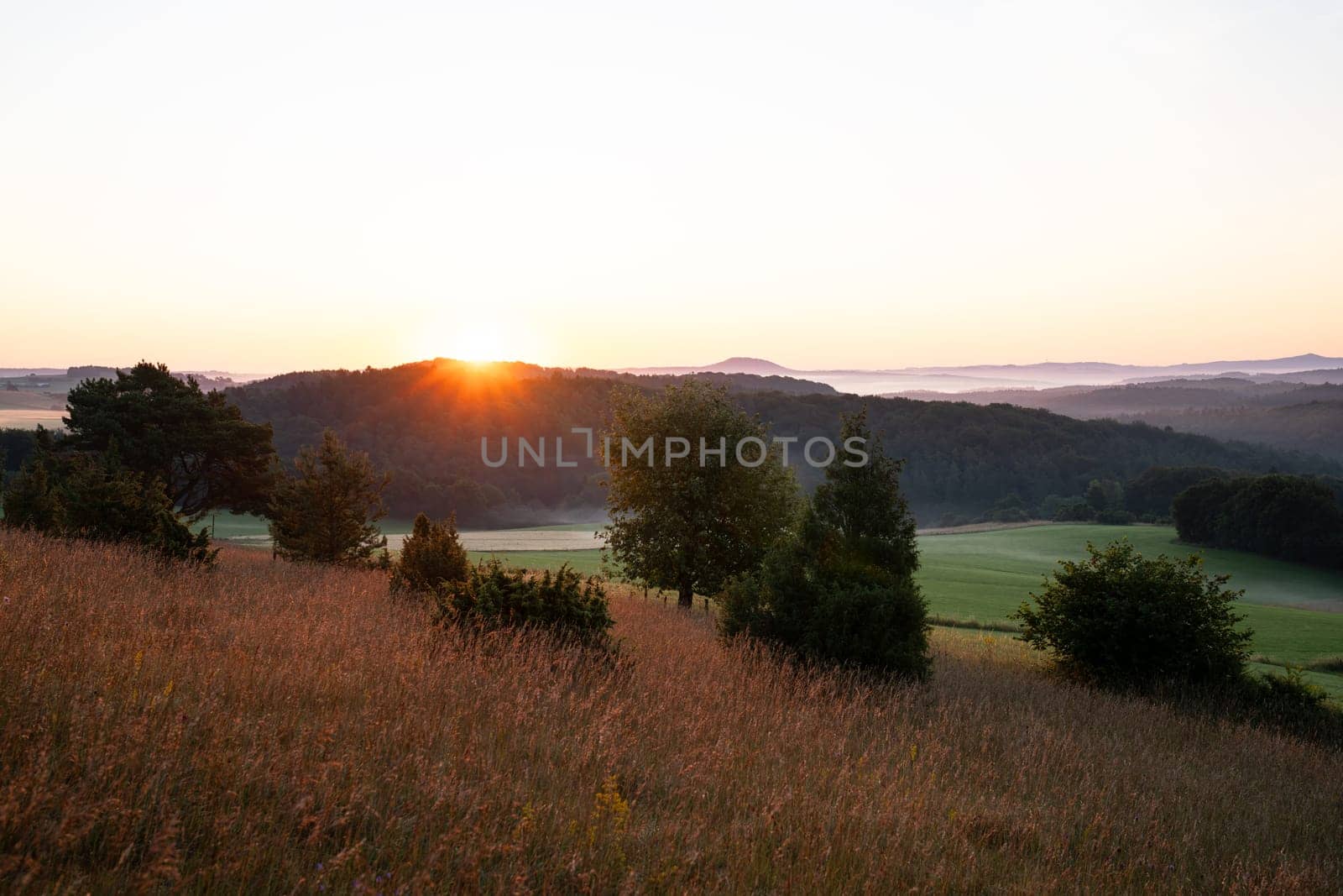Panoramic image of summer landscape within the Eifel close to Blankenheim during sunrise, North Rhine Westphalia, Germany