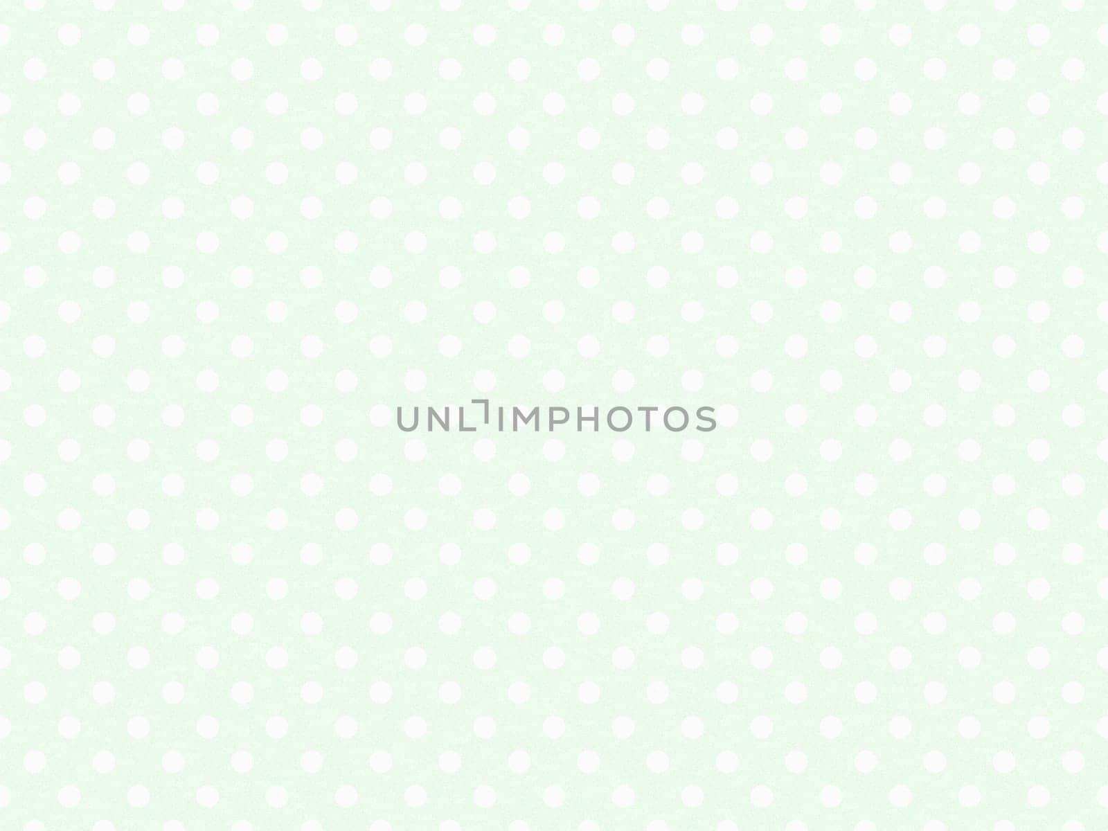 texturised white colour polka dots pattern over honeydew off white useful as a background