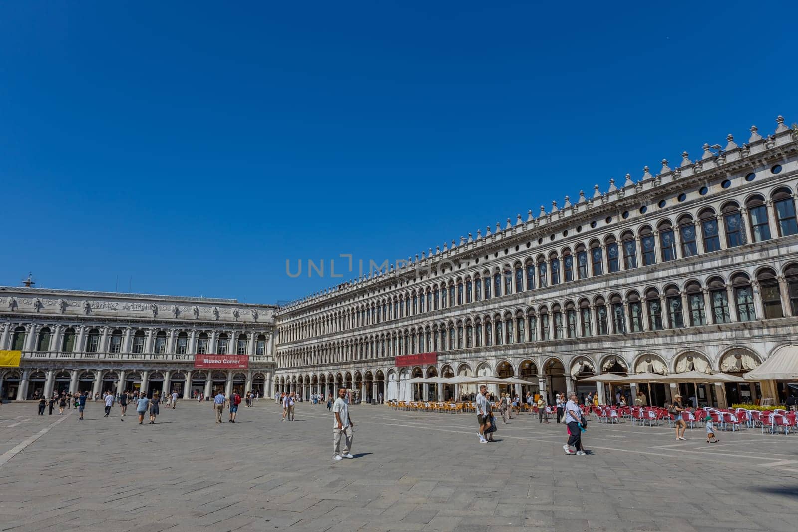 Venice, Italy - July 26, 2024: Tourist on San Marco square. Venice is very popular tourist destination. Venice, Italy