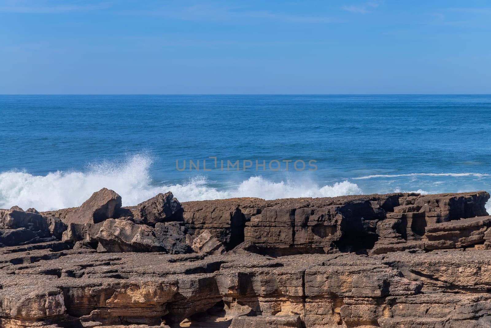 View of ocean waves and fantastic rocky coast in Ericeira, near Lisbon. Portugal