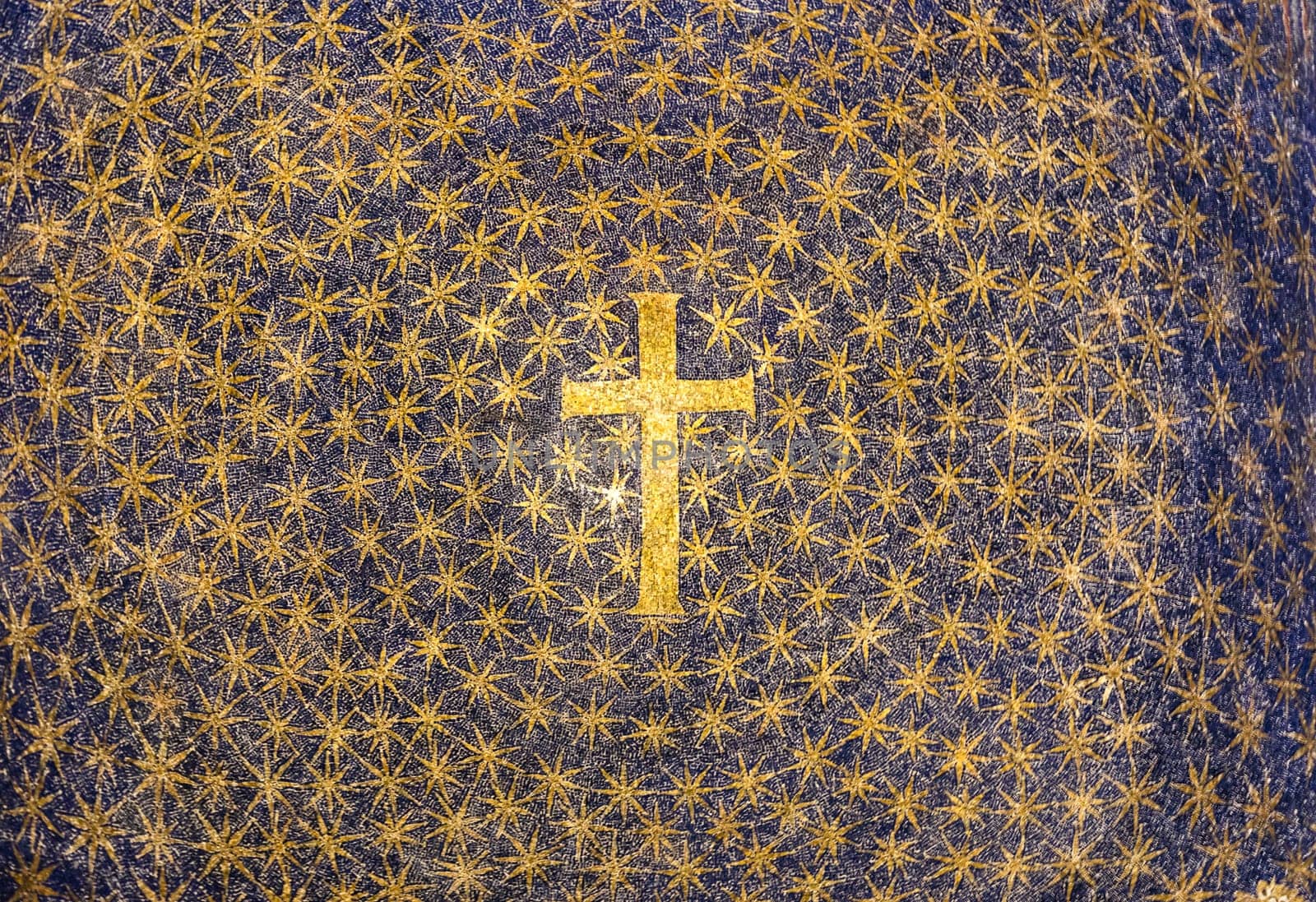 Old cross made of mosaic in Italian Byzantine church. Religion spiritual icon