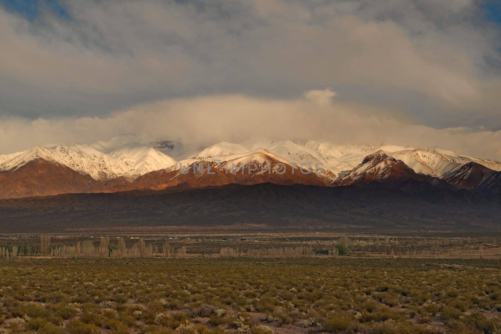 Snow-covered Andes mountains at dawn near Uspallata, Argentina.
