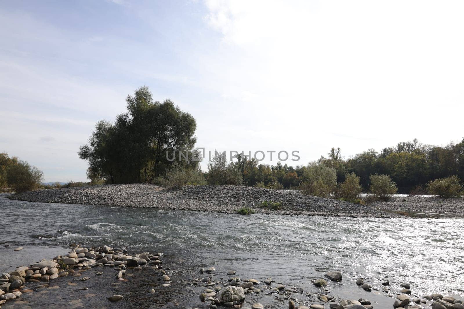 Autumn atmosphere at the Isteiner Schwellen on the Rhine near Efringen-Kirchen (Lörrach district). In bright sunshine,numerous excursionists from Germany and abroad took advantage of the beautiful late summer weather on Sunday to take a trip to the Rhine.