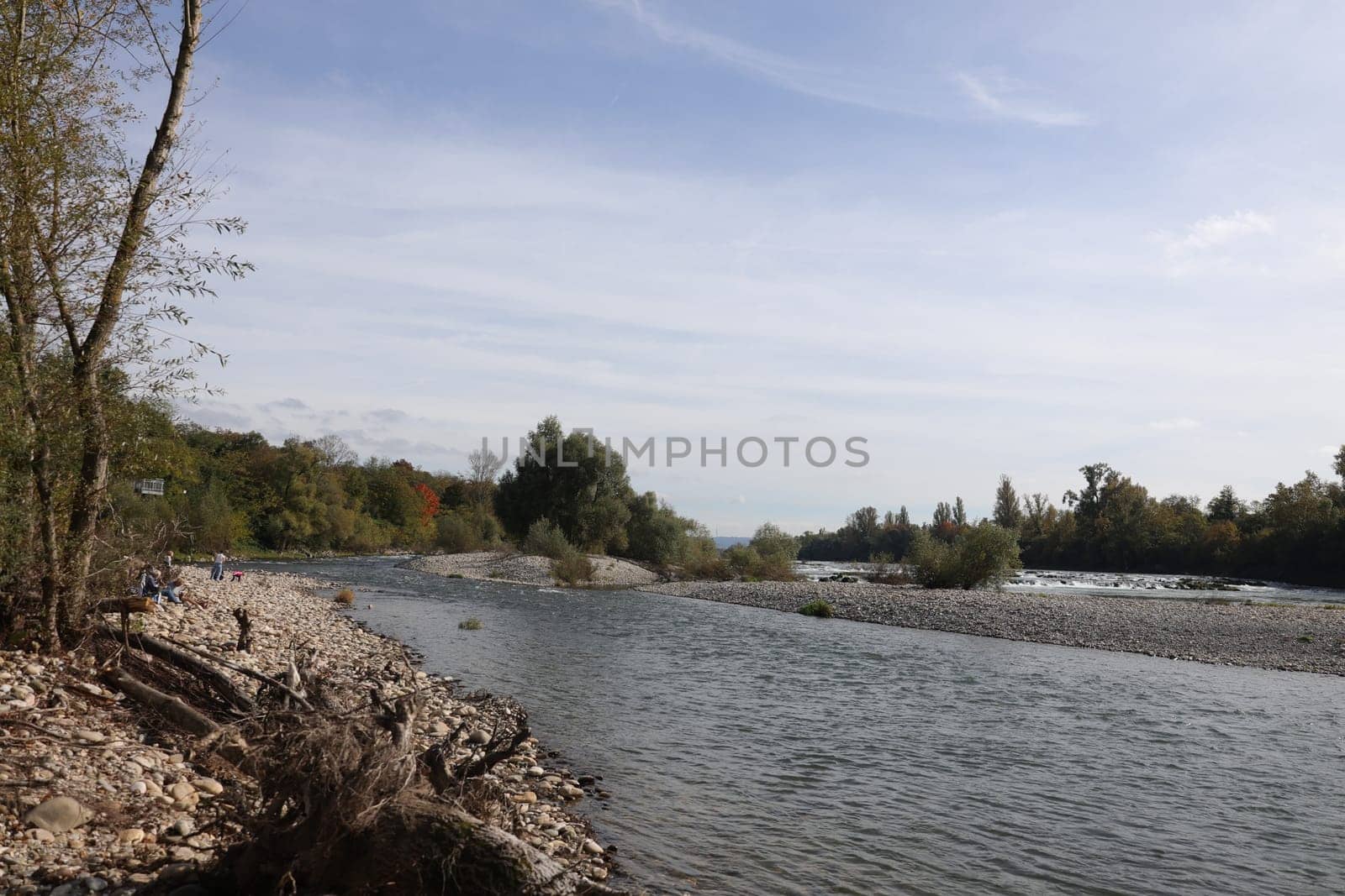 Autumn atmosphere at the Isteiner Schwellen on the Rhine near Efringen-Kirchen (Lörrach district). In bright sunshine,numerous excursionists from Germany and abroad took advantage of the beautiful late summer weather on Sunday to take a trip to the Rhine.