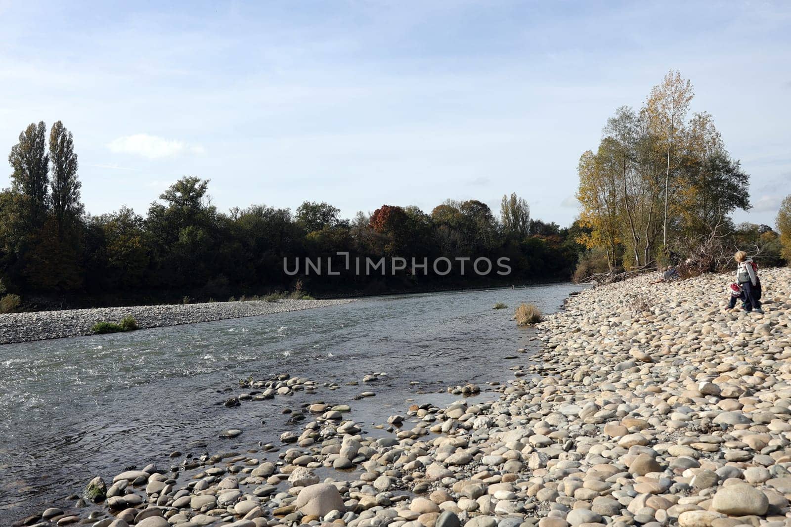 Autumn atmosphere at the Isteiner Schwellen on the Rhine near Efringen-Kirchen (Lörrach district). In bright sunshine,numerous excursionists from Germany and abroad took advantage of the beautiful late summer weather on Sunday to take a trip to the Rhine.