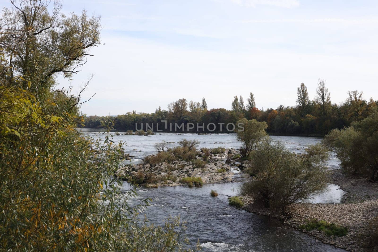 Autumn atmosphere at the Isteiner Schwellen on the Rhine near Efringen-Kirchen (Lörrach district). In bright sunshine,numerous excursionists from Germany and abroad took advantage of the beautiful late summer weather on Sunday to take a trip to the Rhine.