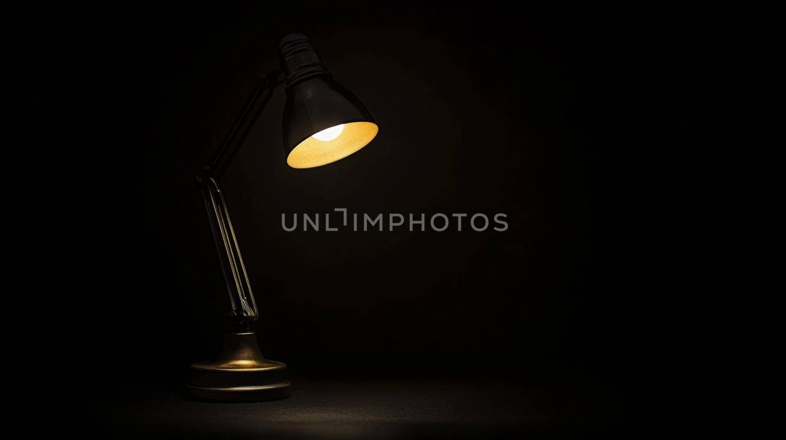 A minimalist image featuring a completely dark black background, illuminated only by a solitary light from a lamp. The striking contrast between light and shadow creates a dramatic and contemplative atmosphere, evoking feelings of solitude, focus, and serenity.