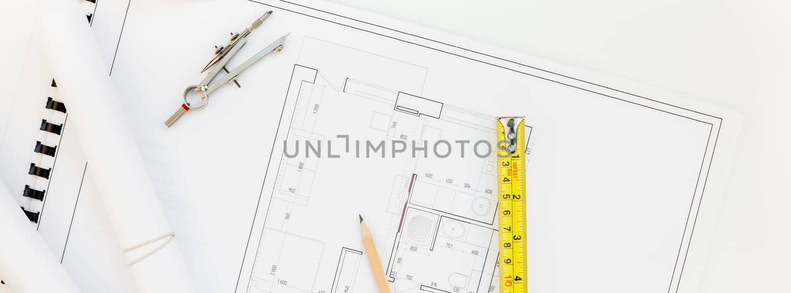 Creative flat lay long wide banner top view blueprints architectural flat project plan and office supplies on decorator white table workspace swatches tools equipment background copy space concept