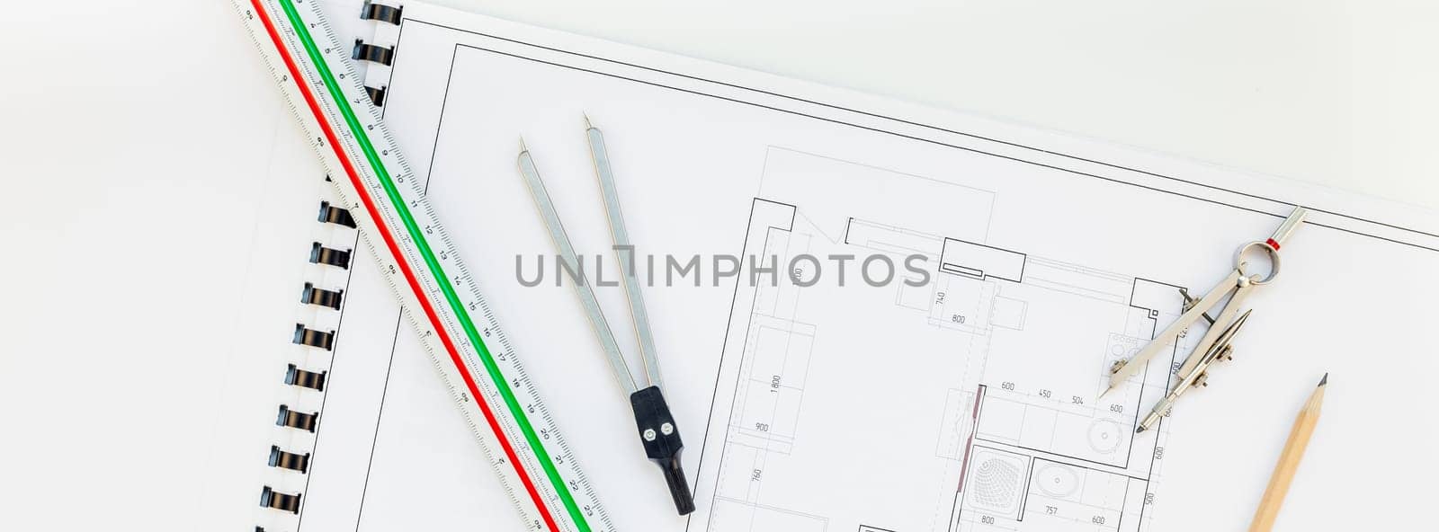 Creative flat lay long wide banner top view blueprints architectural flat project plan and office supplies on decorator white table workspace swatches tools equipment background copy space concept