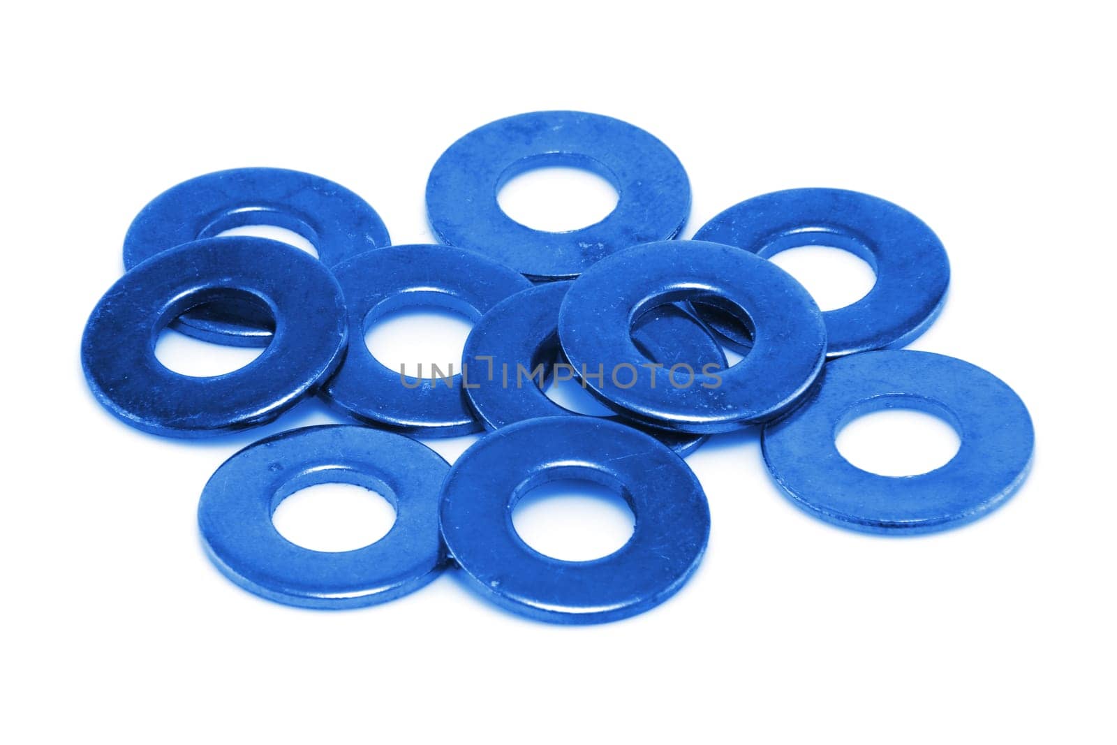 A heap of blue coloured washers on white background