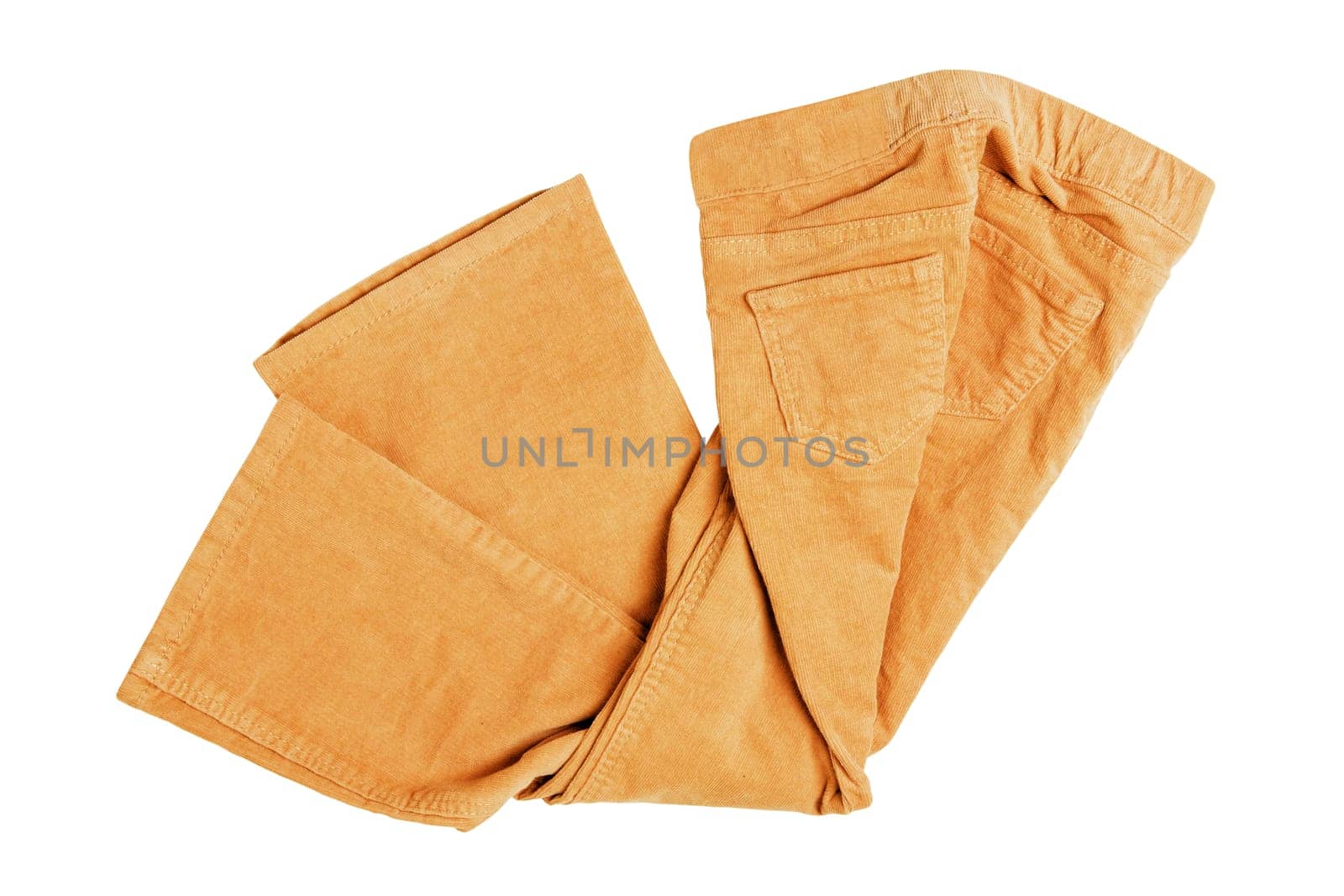 Women casual pants. Womans yellow jeans, corduroy trousers or jersey sweatpants isolated on a white background. Clipping path. Jogging outfit for workout.
