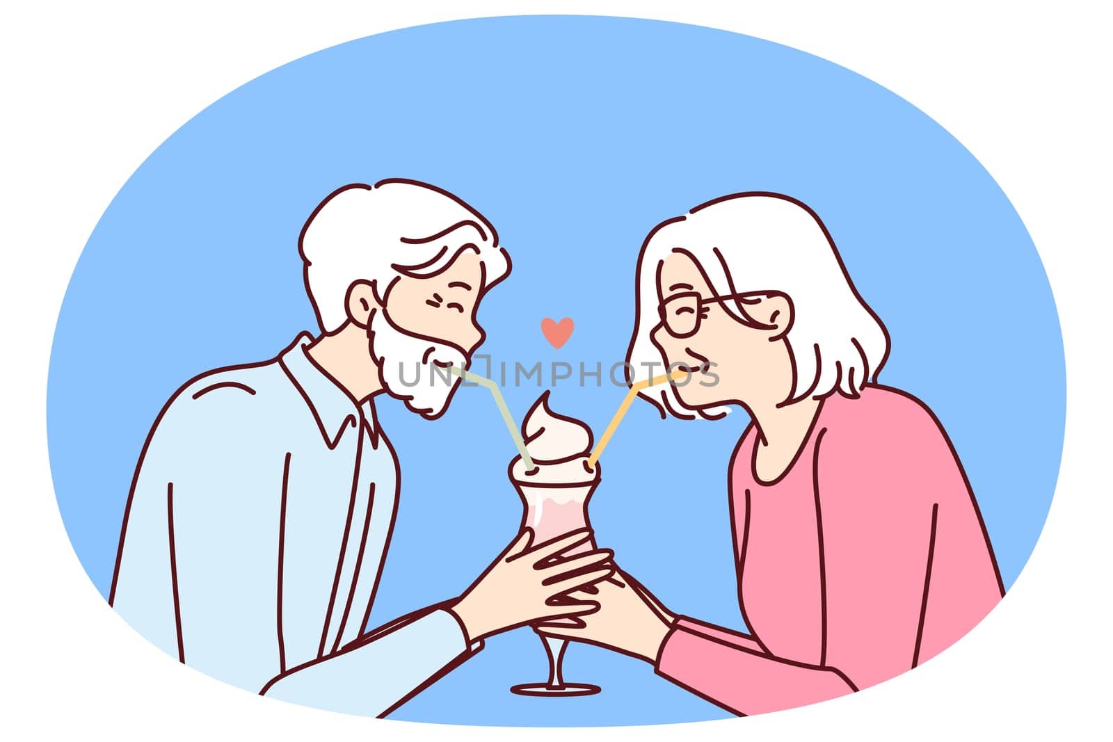 Elderly romantic couple drinking cocktail from straws together enjoying retirement and dating