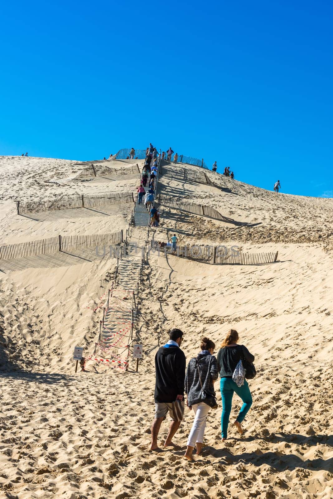 FRANCE, LA TESTE-DE-BUCH - SEPTEMBER 19: people visiting the famous highest sand dune in Europe Dune of Pyla on September 19, 2015