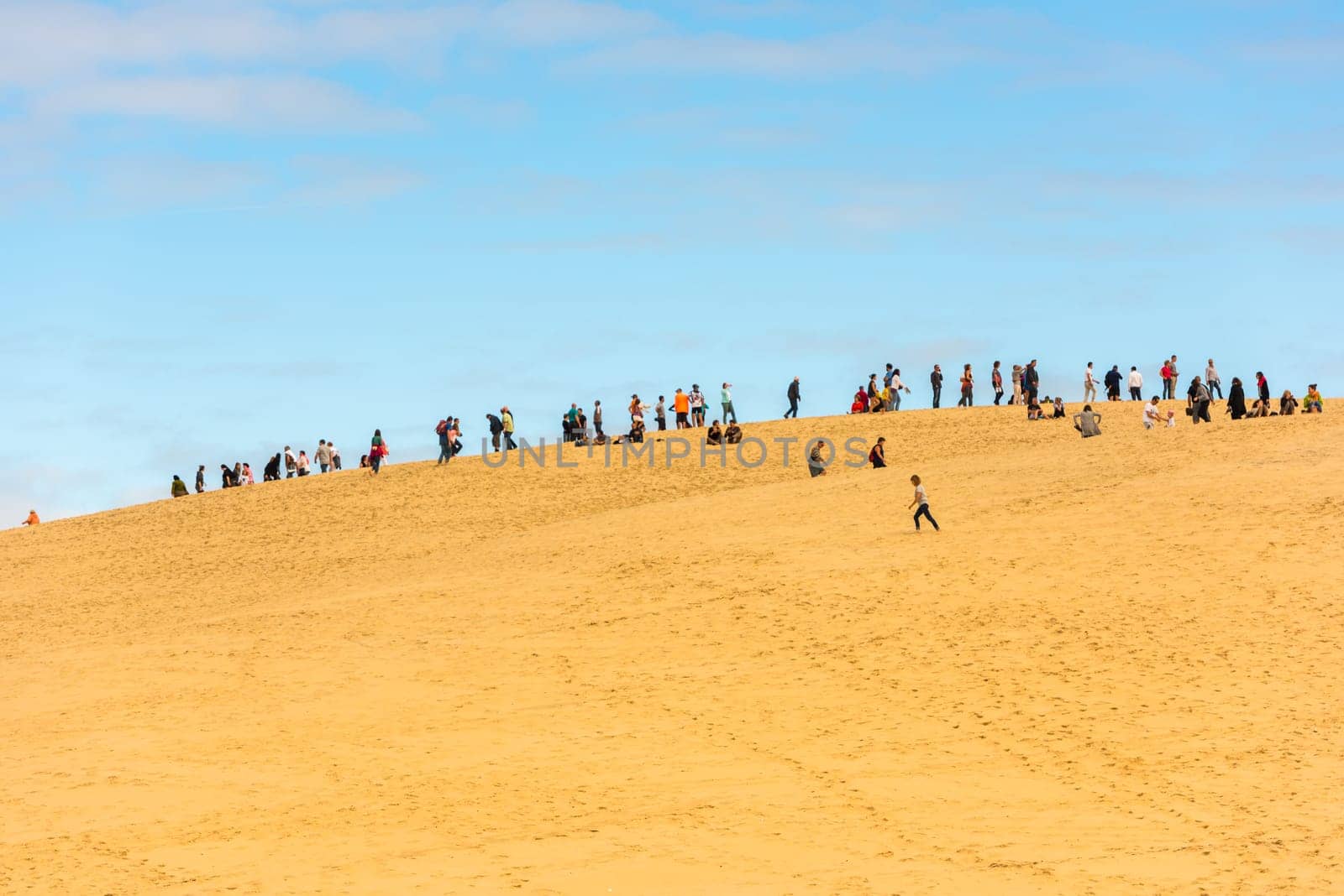FRANCE, LA TESTE-DE-BUCH - SEPTEMBER 19: people visiting the famous highest sand dune in Europe Dune of Pyla on September 19, 2015