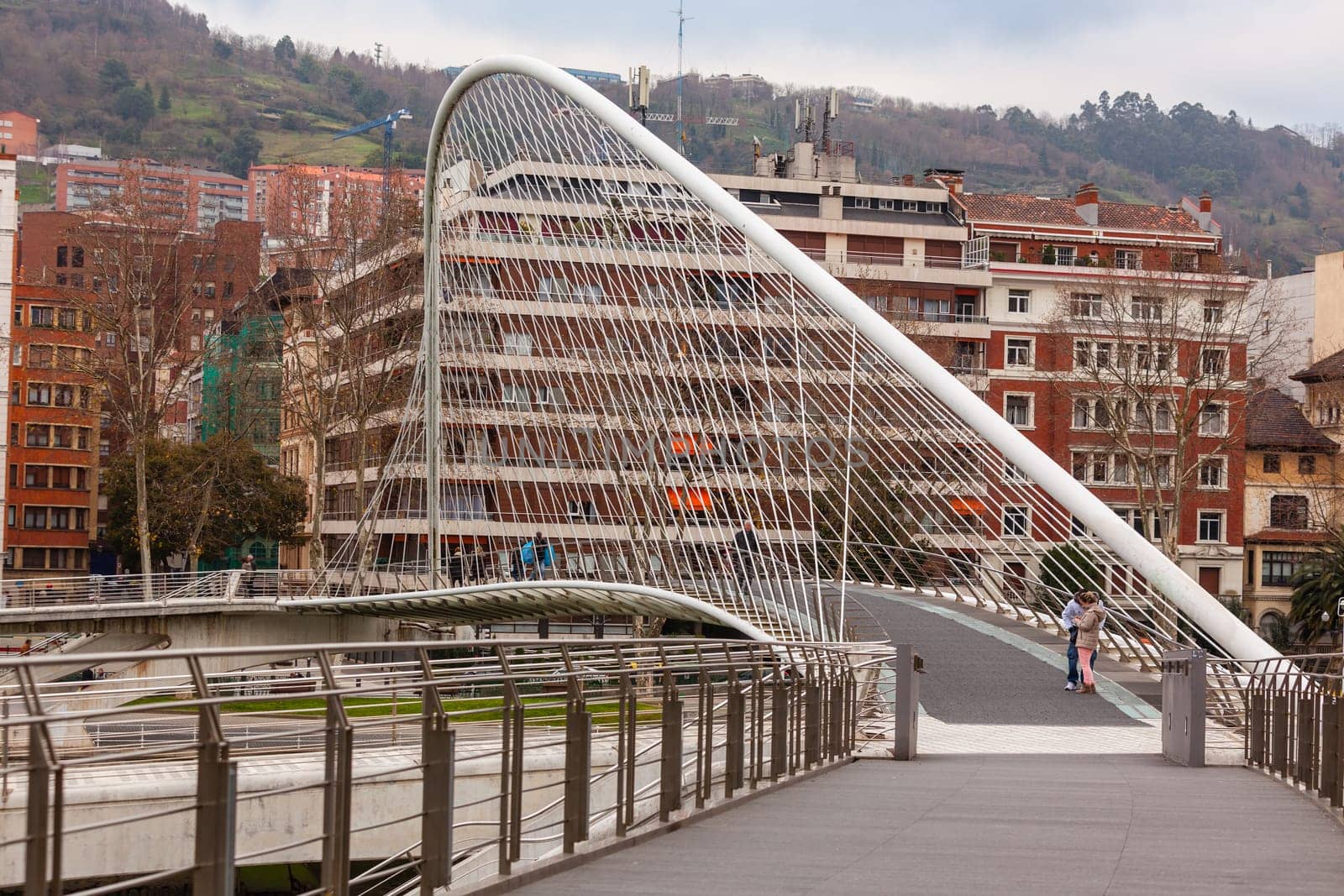 The Zubizuri, the Campo Volantin Footbridge in Bilbao, Spain, modern pedestrian tied arch crossing of the Nervion River by Santiago Calatrava architect