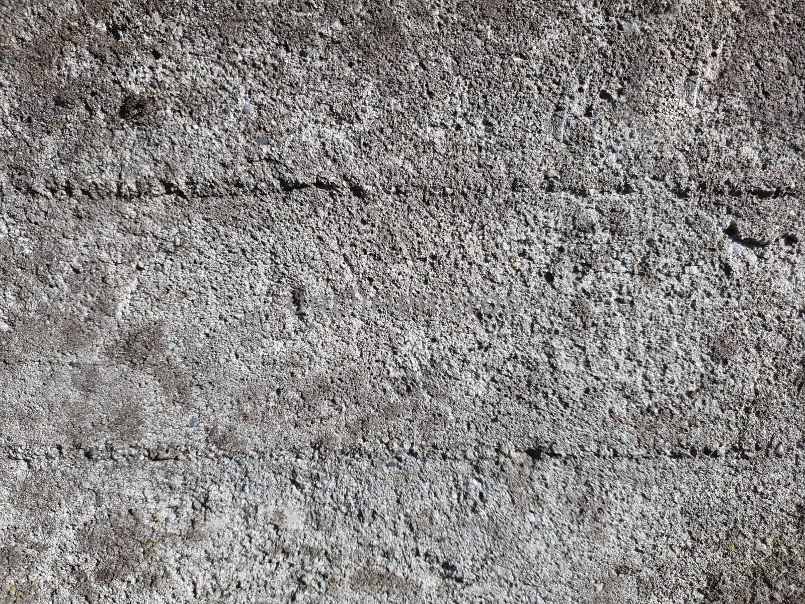 grey concrete wall texture useful as a background
