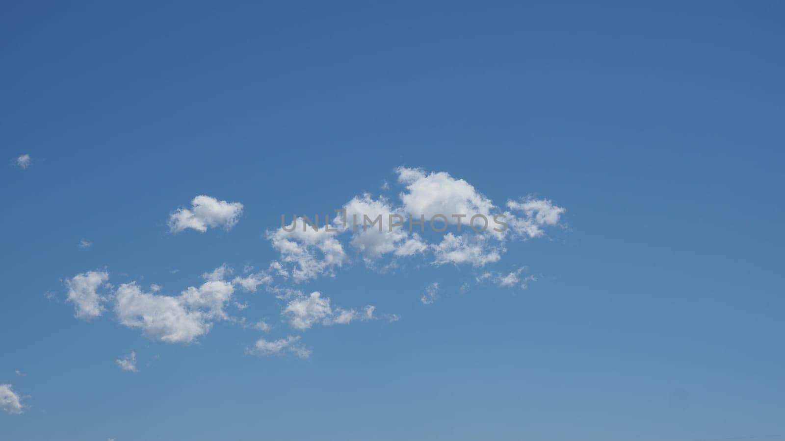blue sky with clouds useful as a background
