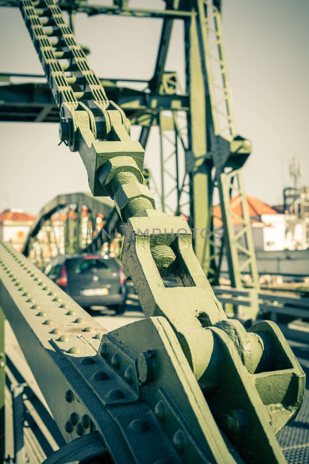 Metal structure elevation bridge over Sado river. Alcacer do Sal, Portugal. Filtered shot