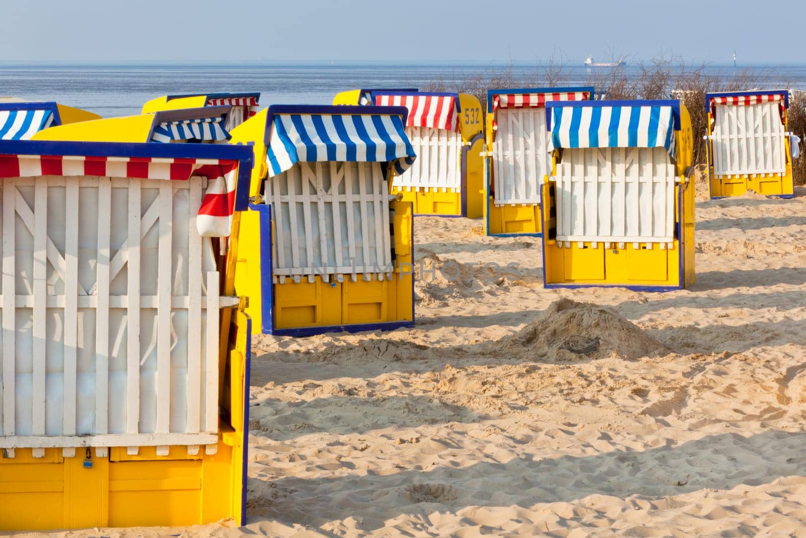 Beach wicker chairs strandkorb in Northern Germany. North sea