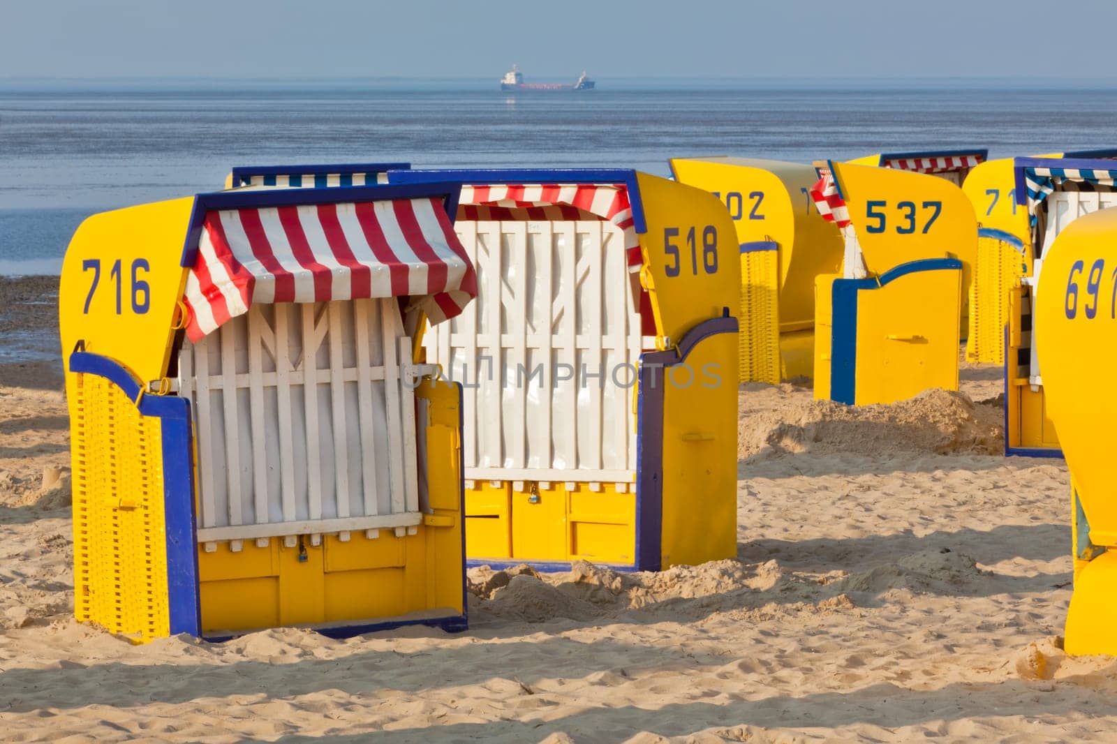 Beach wicker chairs strandkorb in Northern Germany. North sea