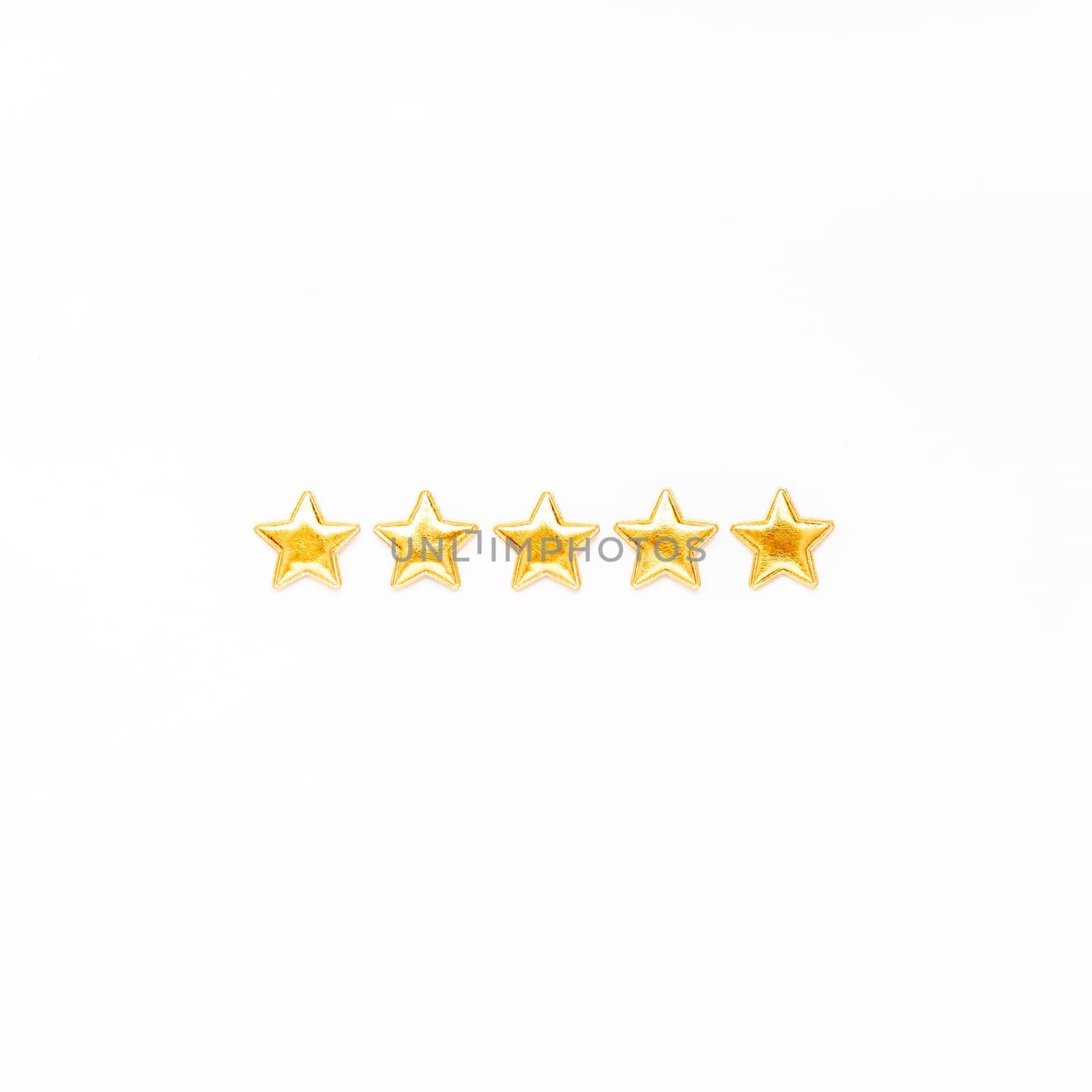 Customer Experience Feedback Concept. Golden five 5 stars, best excellent services rating for satisfaction isolated on white background. Top view, copy space for your text