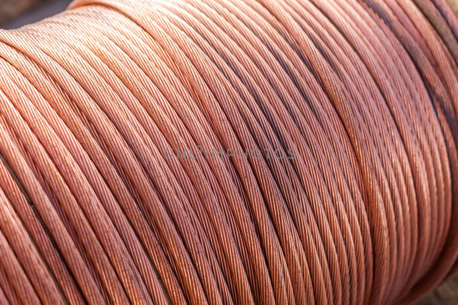 large spools of electric cable. horizontal shot