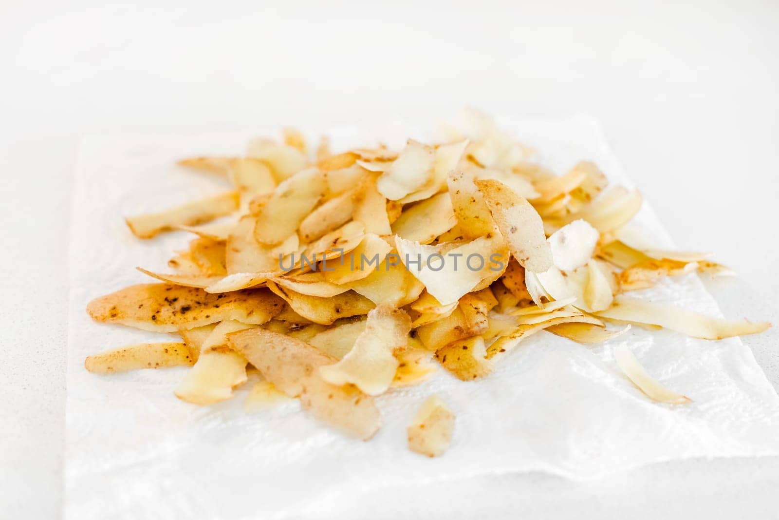 Organic home cooking food waste ready to compost. Ecological concept. Food leftovers, Vegetable Peelings on kitchen table. Environmentally responsible behavior, waste management, recycling garbage.