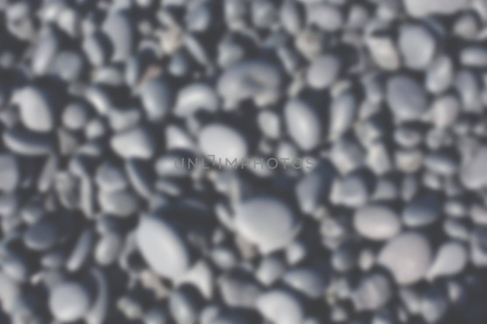 Icelandic Beach Pebbles Background. Horizontal defocused blur shot