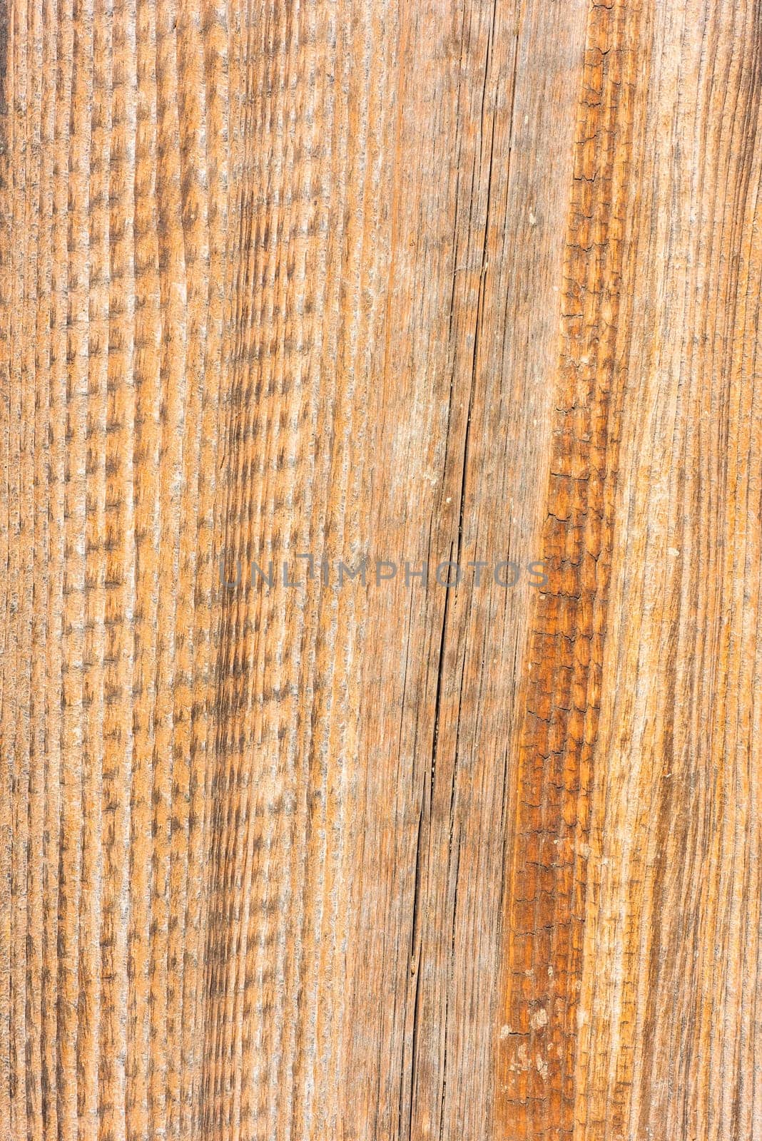 Old wooden plank surface background. Vertical shot