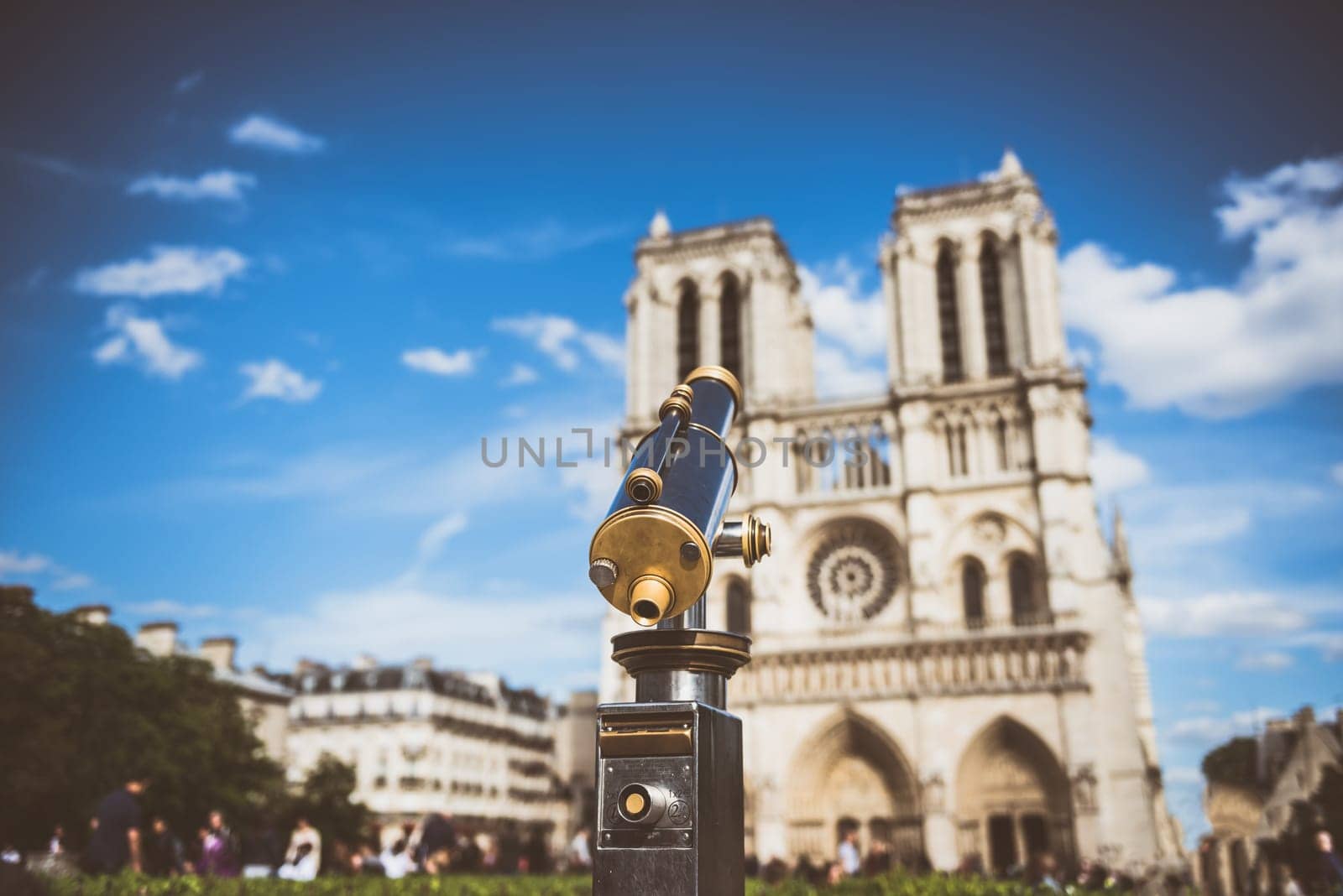 Telescope overlooking for Cathedral of Notre Dame in Paris