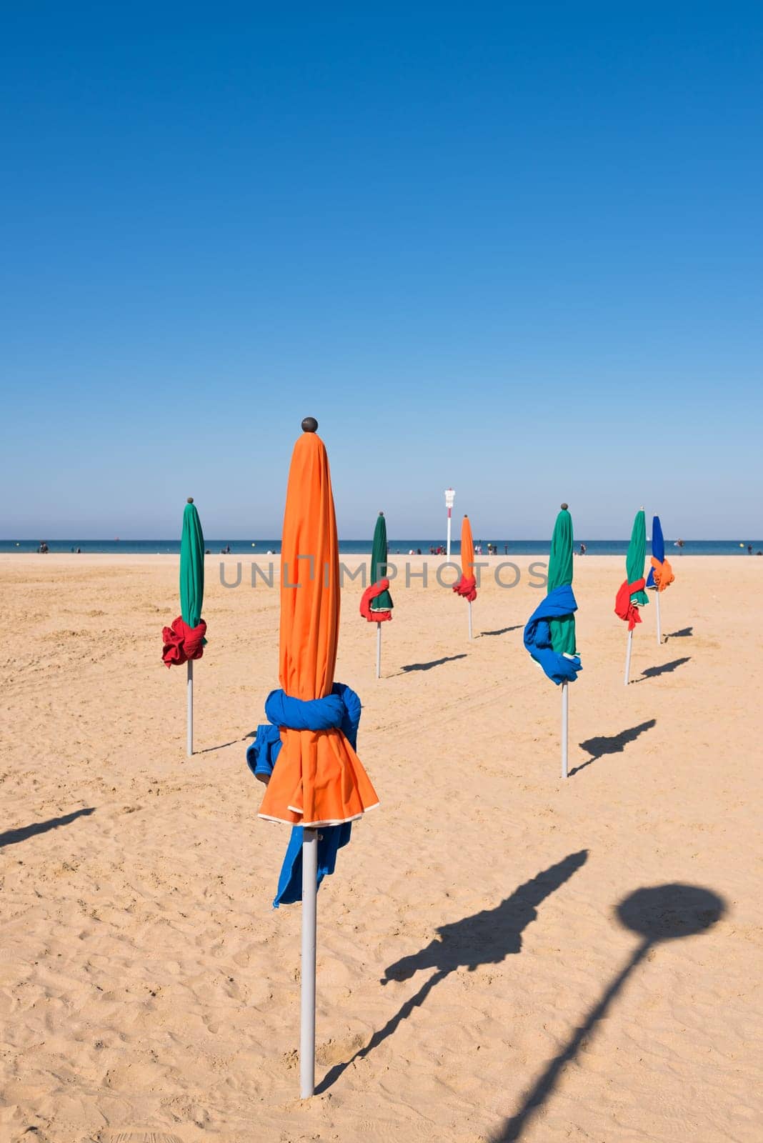 The famous colorful parasols on Deauville beach, Normandy, Northern France