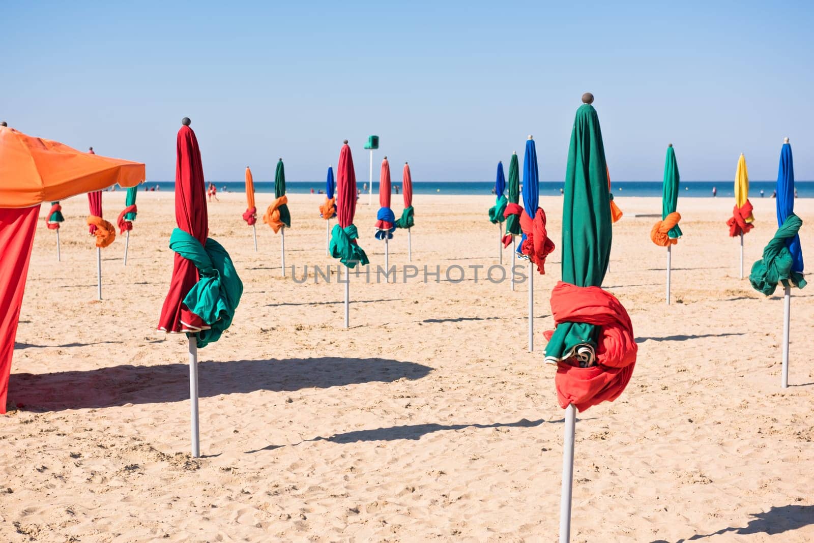 The famous colorful parasols on Deauville beach, Normandy, Northern France