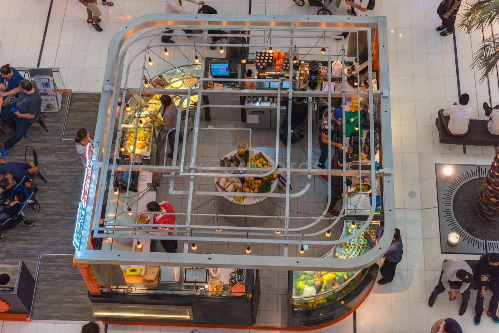 UAE, DUBAI - DECEMBER 25: people in a cafe in Dubai Mall shopping center on December 25, 2014. Top view