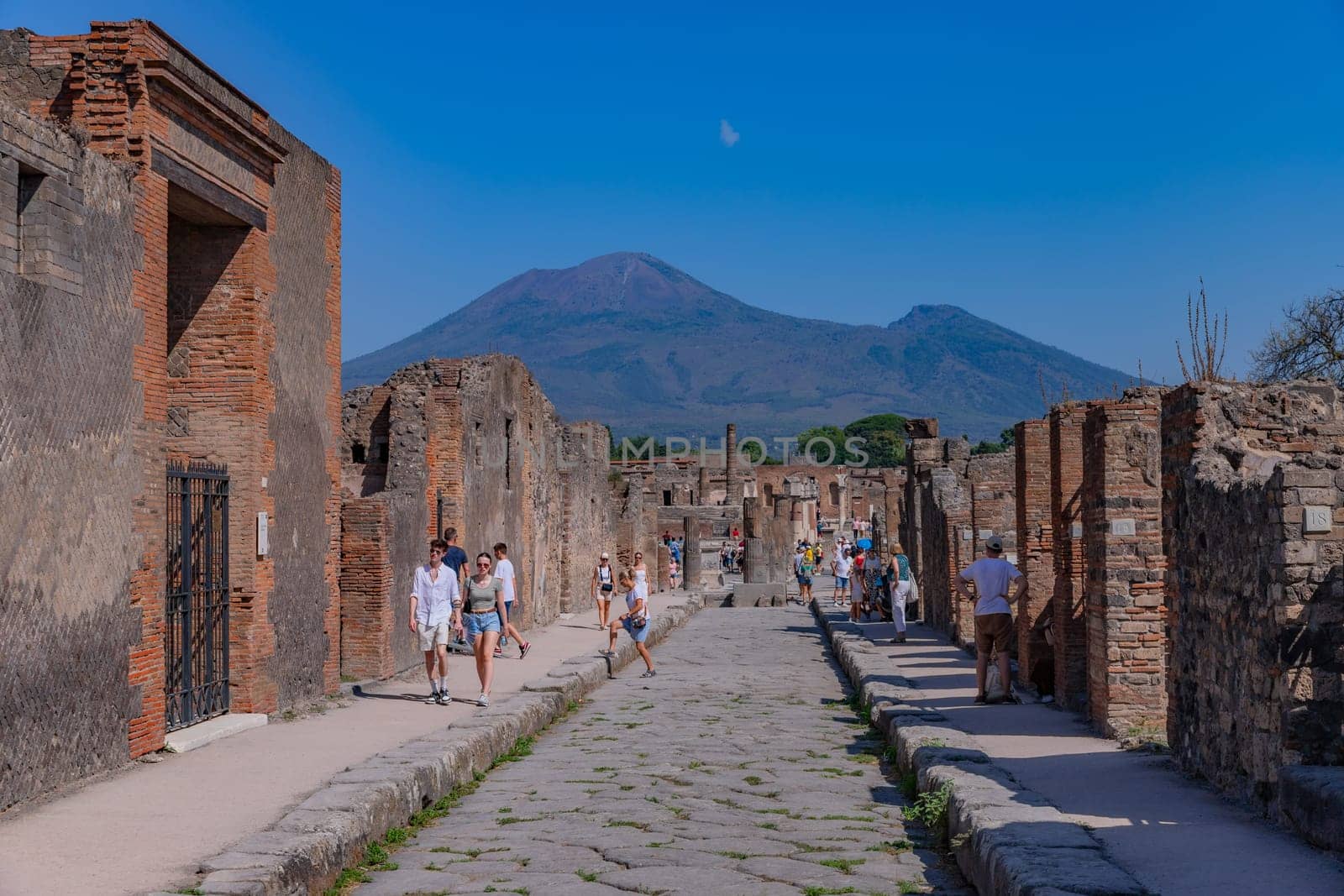 Pompeii, Italy - August 8, 2024: Ruins of a city. Pompeii is an ancient Roman city died from the eruption of Mount Vesuvius in 79 AD.