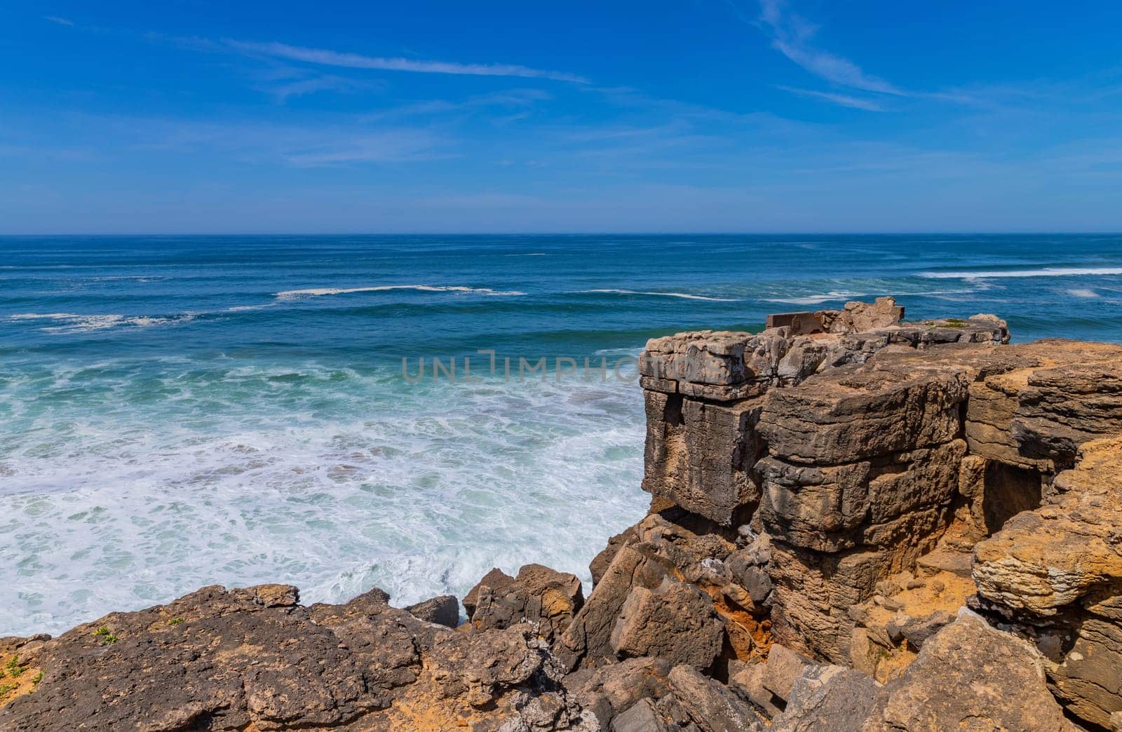 View of ocean waves and fantastic rocky coast in Ericeira, near Lisbon. Portugal