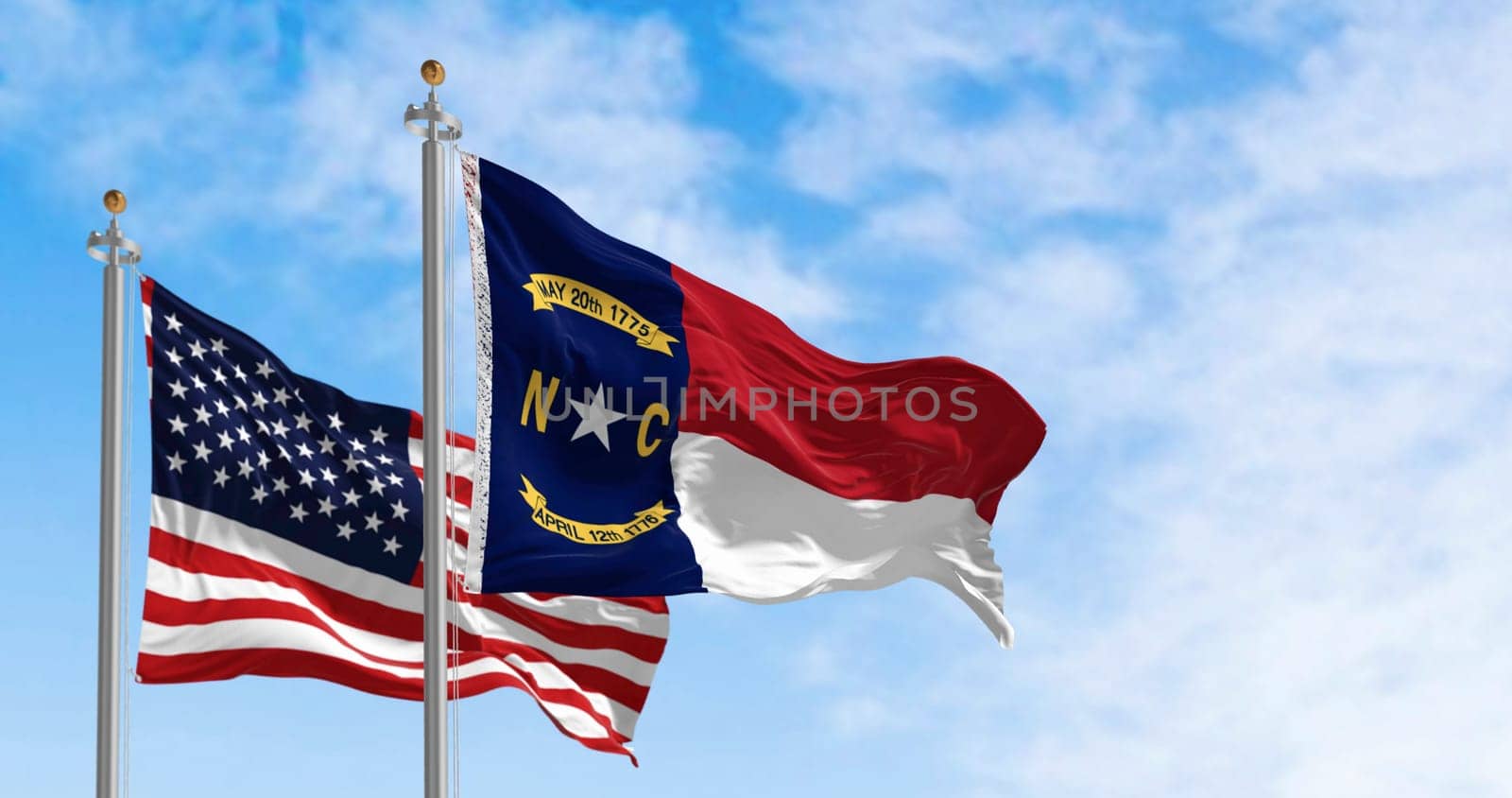 North Carolina state flags waving with american flag. North Carolina is a state in the Southeastern region of the S. Rippled fabric. 3d illustration render. Selective focus. Rippling fabric