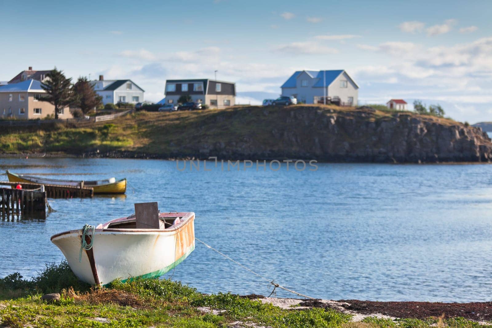 Old White Boat at Icelandic Landscape. Sunny Summer Day