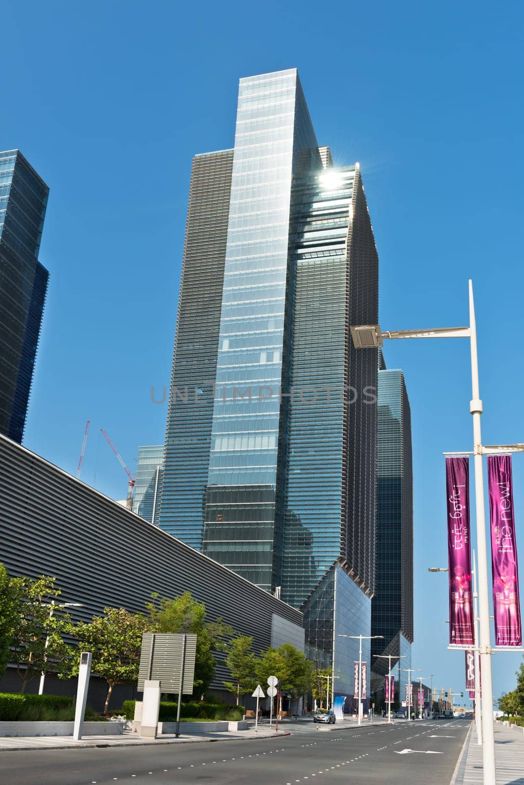 ABU DHABI, UAE - DECEMBER 24: Abu Dhabi Downtown streets with skyscrapers on December 24, 2014. United Arab Emirates