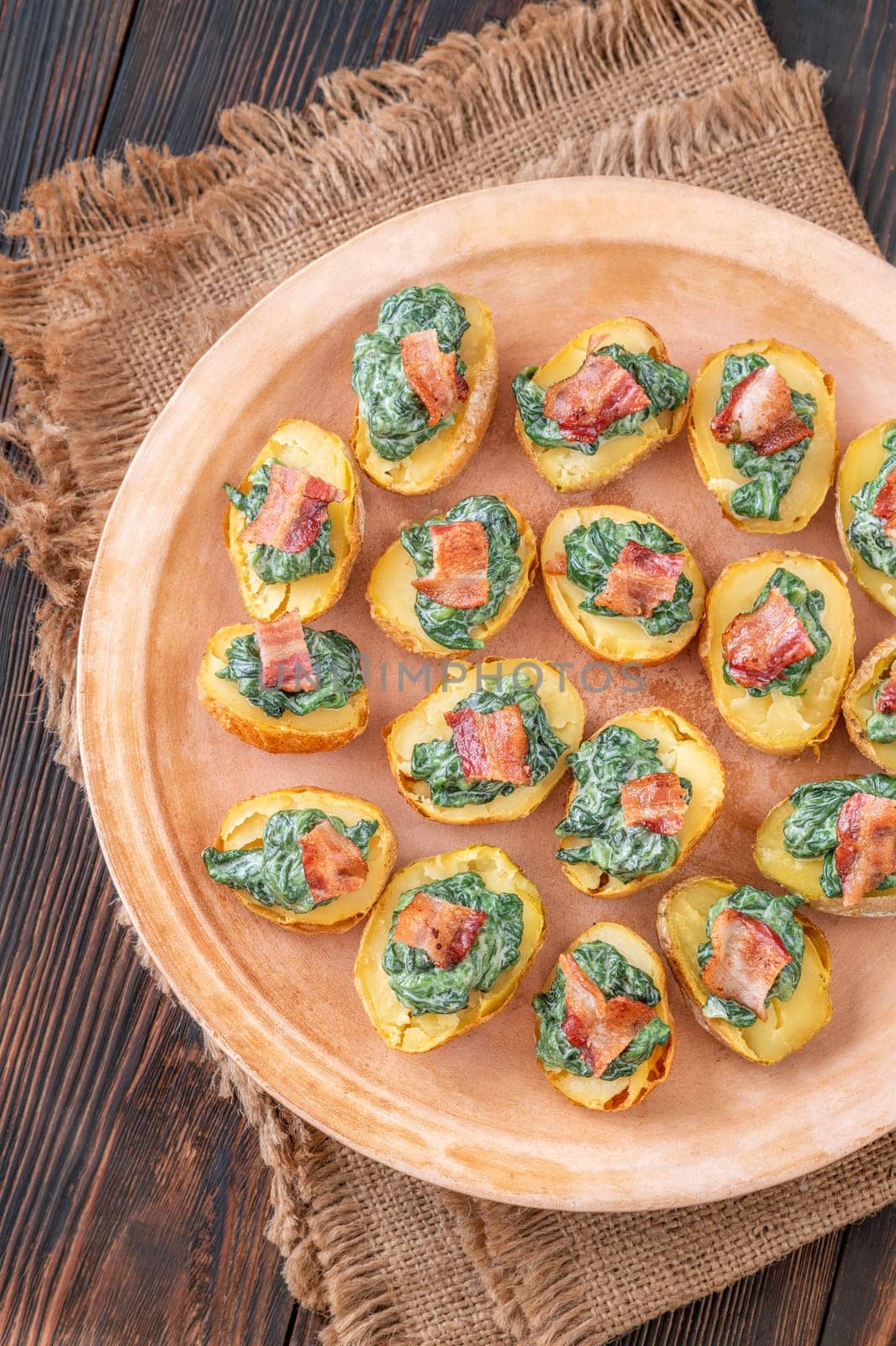 Roasted baby potatoes with creamy spinach and bacon