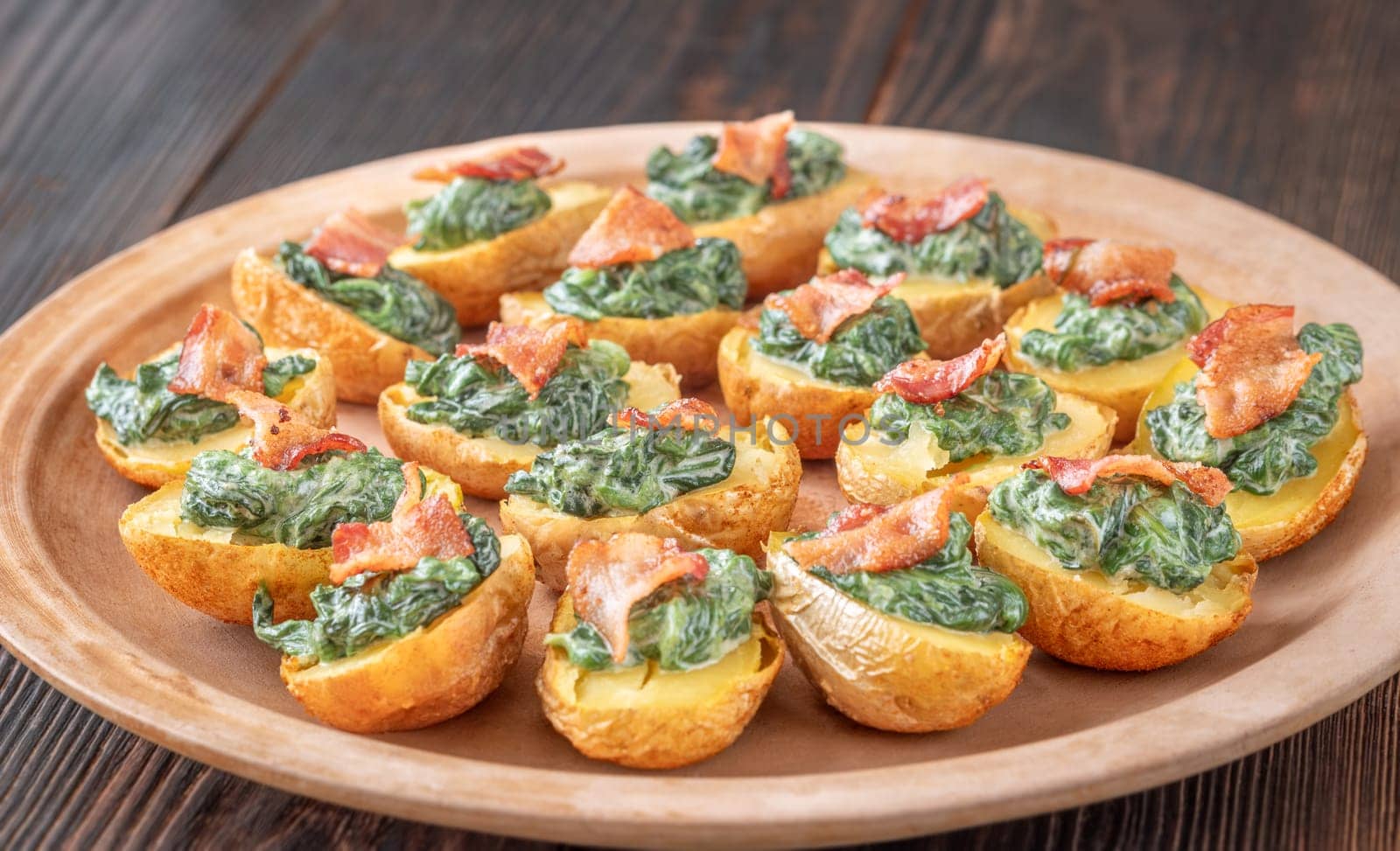 Roasted baby potatoes with creamy spinach and bacon